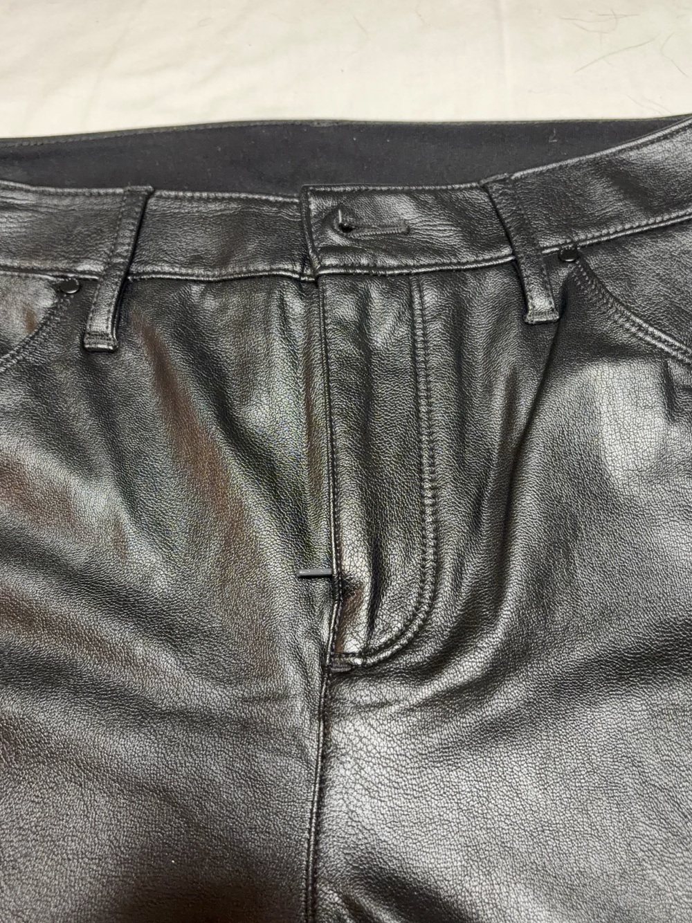 Chico's Black Faux Leather Pants on the front, fabric on the back
